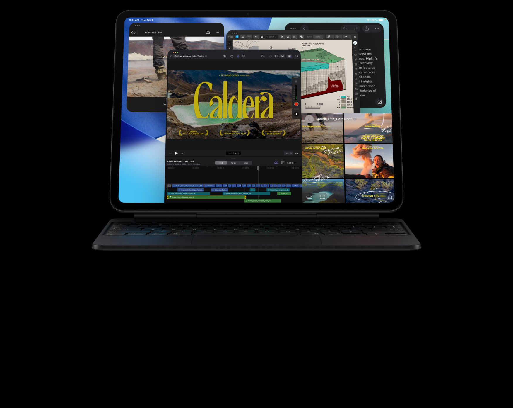 Vooraanzicht van iPad Pro in de kleur Spacezwart in horizontale stand, bevestigd aan Magic Keyboard in de kleur Spacezwart, display met meerdere appvensters: Final Cut Pro met meerdere videobewerkingsfeatures en een tijdlijn, Kaarten, Notities, mediafragmenten