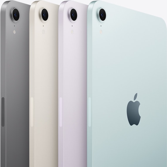 Četru iPad mini modeļu aizmugures skats ar kameru, demonstrējot pieejamās krāsas: astropelēku, zvaigžņu, violetu un zilu.