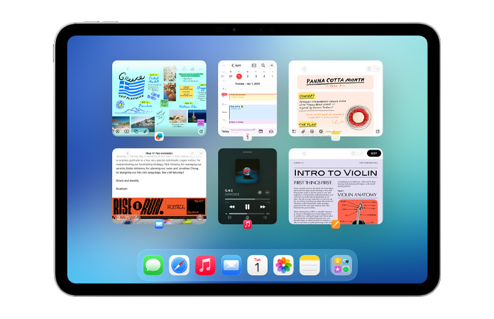 iPad, orientacja pozioma, ekran przedstawia sześć otwartych okien w dwóch rzędach, w tym aplikację Kalendarz, Notatki, Apple Music i Safari